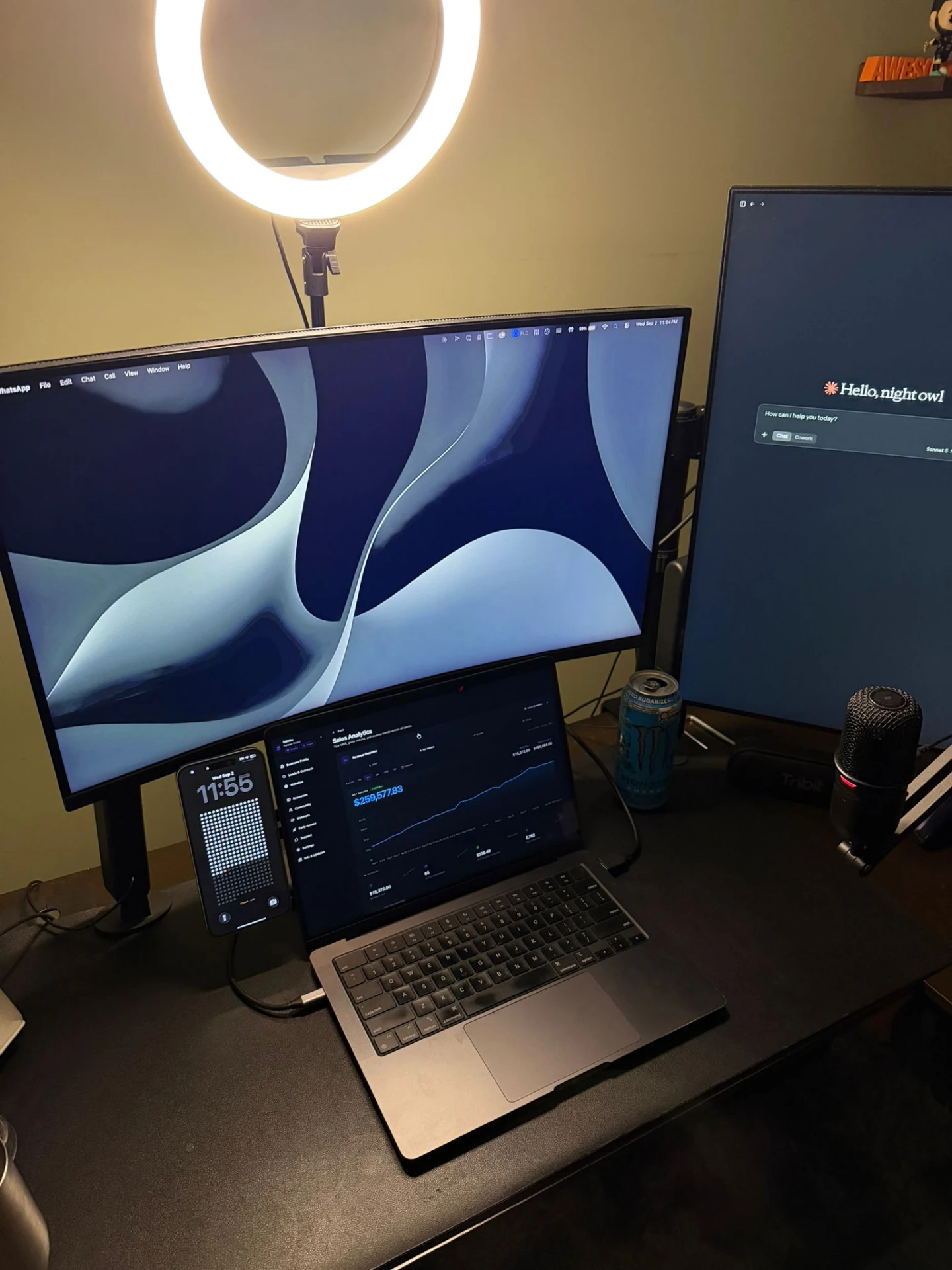 Sahain's desk setup with a laptop